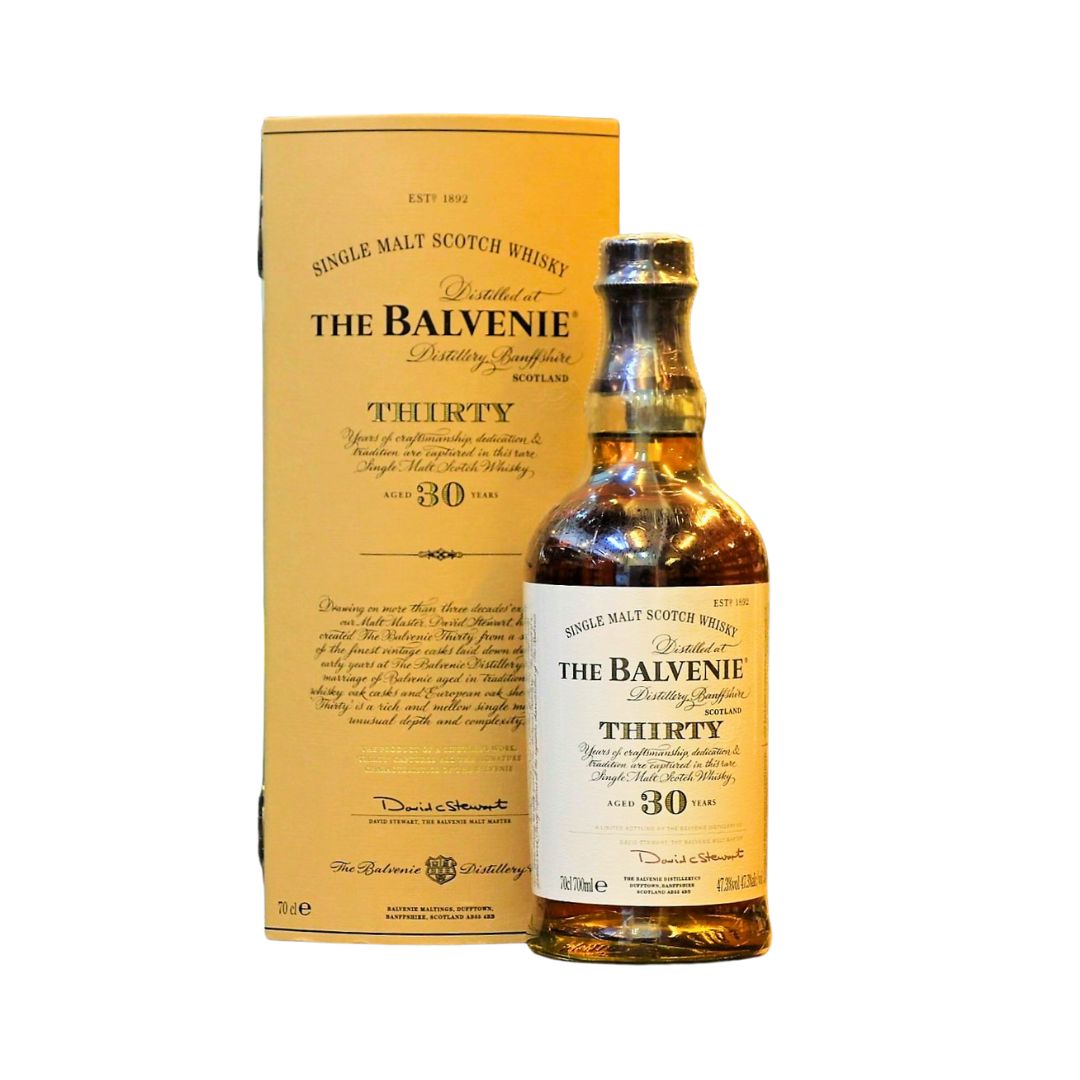 An old presentation (released around 2013) bottle of "The Balvenie 30 Year Old", crafted by malt master David Stewart by vatting Whisky matured in traditional and European oak casks. In our opinion this is indeed a masterpiece and showcases the skills of the malt master in creating a beautifully balanced and impressive aged whisky&nbsp;bottled at a higher ABV of 47.3%. Rich dark chocolate, hints of plum, marzipan and caramelized pear.