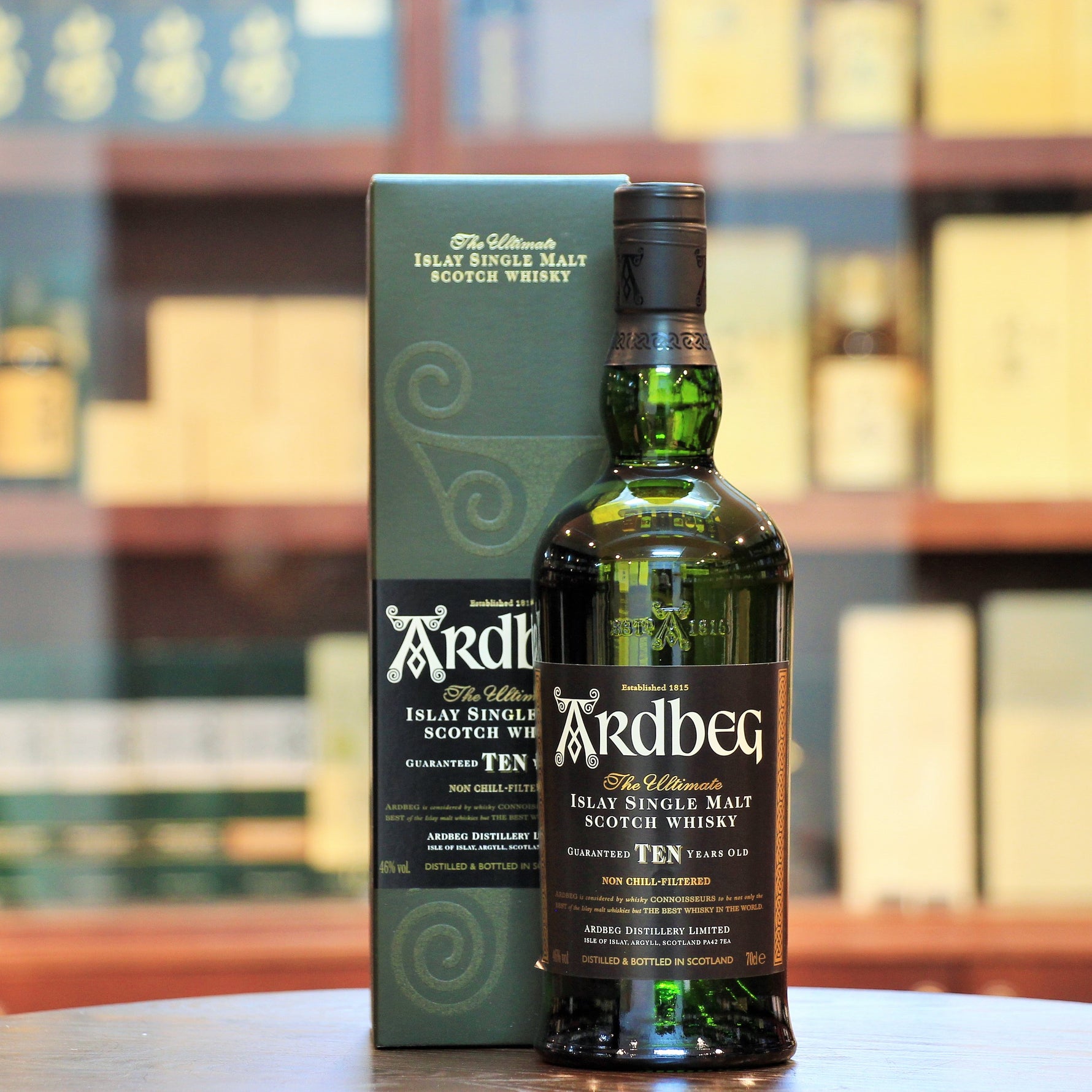 Ardbeg 10 Year Old Single Malt Scotch Whisky is one of the peatiest and most complex whiskies globally. It balances intense peat with the natural sweetness of malt. Awarded World Whisky of the Year in 2008, it has a light gold color and aromas of smoky fruit, zesty lemon and lime, and waxy dark chocolate. On the palate, it offers crackling peat, tangy citrus, black pepper, and cinnamon-spiced toffee, alongside briny notes of buttermilk, ripe bananas, and currants. The finish is long and rich, featuring dry 